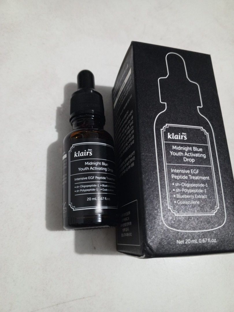 Dear Klairs Midnight Blue Youth Activating Drop 20ml (Category: Face Care) located in Manila. Submitted by yeshaaaaaaa (Listing ID 1465494779, Image 2). Description: Dear Klairs Midnight Blue Youth Activating Drop. 20ml bottle with original black box included. Intensive EGF peptide treatment formulation. Contains sh-Oligopeptide-1, sh-Polypeptide-1, blueberry extract, and guaiazulene. Unopened packaging, box shows crisp white lettering on dark ba