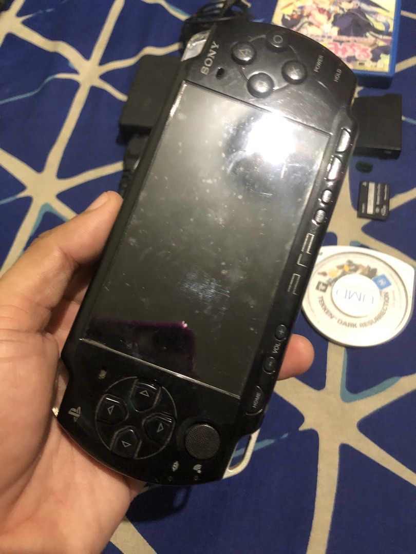 Defective PSP 2004 set (Category: PlayStation) located in Quezon City. Submitted by markgolveo (Listing ID 1465481535, Image 2). Description: Defective unit Tried plugging in adapter not powering on , plugged it before it powered abit but as of now no response Spots on screen seems like mold Latch lock on battery port broken as shown on images Inclusions of PSP unit 2004 model Authentic adapter umd disc tekken dark ressurection Low capacity mem c