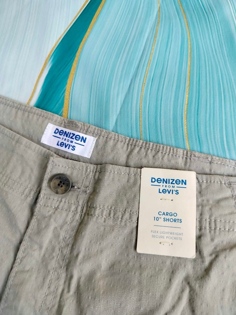 Denizen from Levi's Cargo 10" Shorts W38 Grey (Category: Shorts) located in Manila. Submitted by virgiliosa38485 (Listing ID 1465505694, Image 2). Description: Denizen from Levi's cargo shorts in grey. Size W38. 10 inch length with flex lightweight material and secure pockets. Brand new with tags attached..