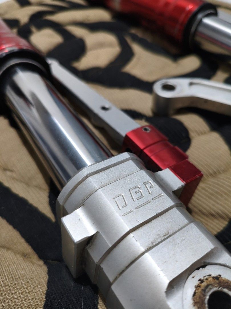 DGP Inverted Front shock Aerox V1 V2 (Category: Suspension Parts & Accessories) located in Makati City. Submitted by rom.rgg (Listing ID 1465567967, Image 3). Description: Original DGP Inverted Front shock aerox V1 V2 🔺 Adjustable preload issue: Need na ipa repack - malambot na play May tagas left side kaya papalitan yung rubber seal pag pinarepack Pass sa maselan Loc: 📍Taguig - Grace residence.