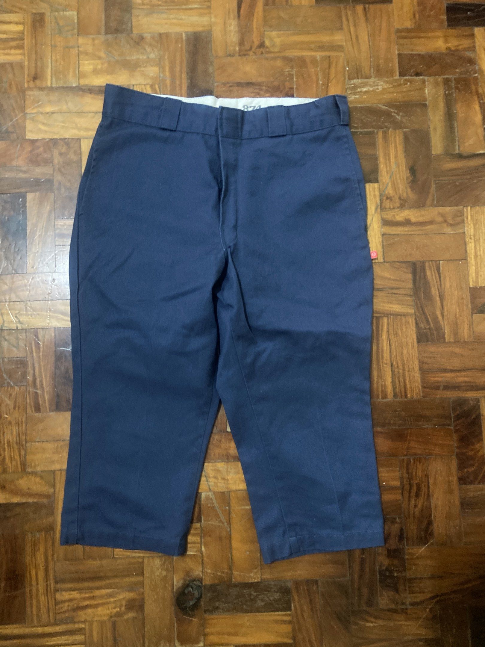 Dickies 874 Original Fit Work tocong short Navy Blue (Category: Trousers) located in Pilar. Submitted by romeoabejo54125 (Listing ID 1465511146, Image 1). Description: - Brand: Dickies - Model: 874 Original Fit Work tocong short - Color: Navy Blue - Material: Sturdy twill fabric - Features: Belt loops, zip fly, secure back pockets with button closure, and woven logo patch - Condition: Clean waistband lining with printed branding - Ideal for: Dail