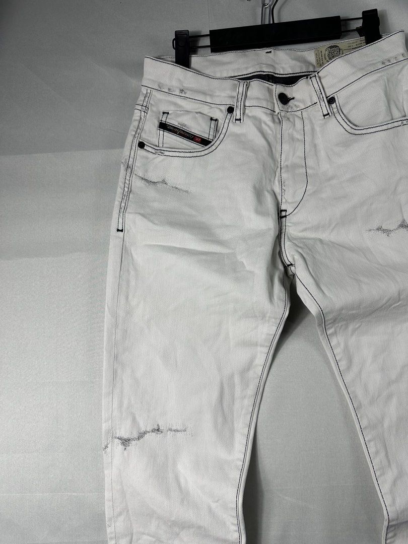 Diesel D Struct Tappered Jeans (Category: Jeans) located in Cabanglasan. Submitted by thefashiongarage.co (Listing ID 1465490874, Image 3). Description: Title - Diesel Model/Name - D Struct Size on Tag - 29 Conditiion - Excellent Condition with no major issue - Factory Distressed Minimal washable stain sa may knee Dimension (WxLxH) - 15x40x6 Waist can still stretch up to 16 inches Category- Pants/ Casual Fitting - Slim Tappered Made in - Romania 