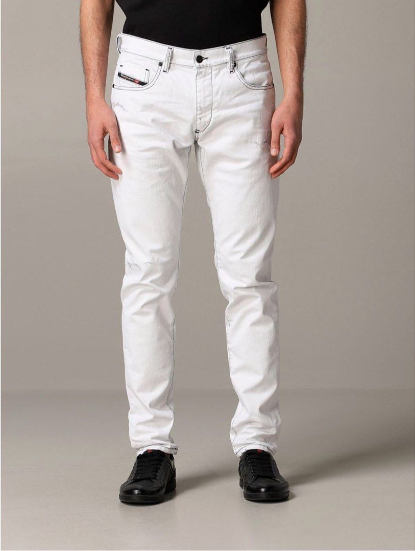 Diesel D Struct Tappered Jeans (Category: Jeans) located in Cabanglasan. Submitted by thefashiongarage.co (Listing ID 1465490874, Image 1). Description: Title - Diesel Model/Name - D Struct Size on Tag - 29 Conditiion - Excellent Condition with no major issue - Factory Distressed Minimal washable stain sa may knee Dimension (WxLxH) - 15x40x6 Waist can still stretch up to 16 inches Category- Pants/ Casual Fitting - Slim Tappered Made in - Romania 