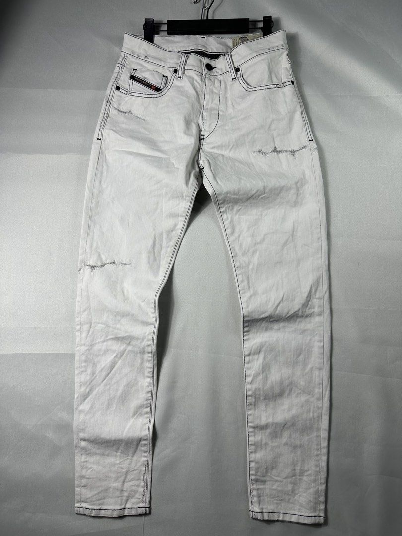 Diesel D Struct Tappered Jeans (Category: Jeans) located in Cabanglasan. Submitted by thefashiongarage.co (Listing ID 1465490874, Image 2). Description: Title - Diesel Model/Name - D Struct Size on Tag - 29 Conditiion - Excellent Condition with no major issue - Factory Distressed Minimal washable stain sa may knee Dimension (WxLxH) - 15x40x6 Waist can still stretch up to 16 inches Category- Pants/ Casual Fitting - Slim Tappered Made in - Romania 