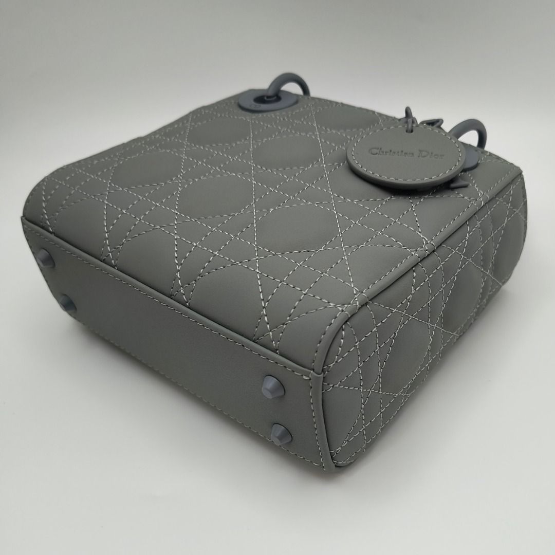 Dior Mini Lady Dior Bag Ultra Matte Grey (Category: Luxury Bags & Wallets) located in Cebu City. Submitted by affordabagss (Listing ID 1465483363, Image 3). Description: Dior Mini Lady Dior bag in grey-green Ultra Matte Cannage calfskin. Features tonal D.I.O.R. charms, structured top handles and a removable chain strap. Finished with the signature Cannage stitching and can be carried by hand or worn crossbody. Length: 17 cm Height: 15 cm Depth: 7