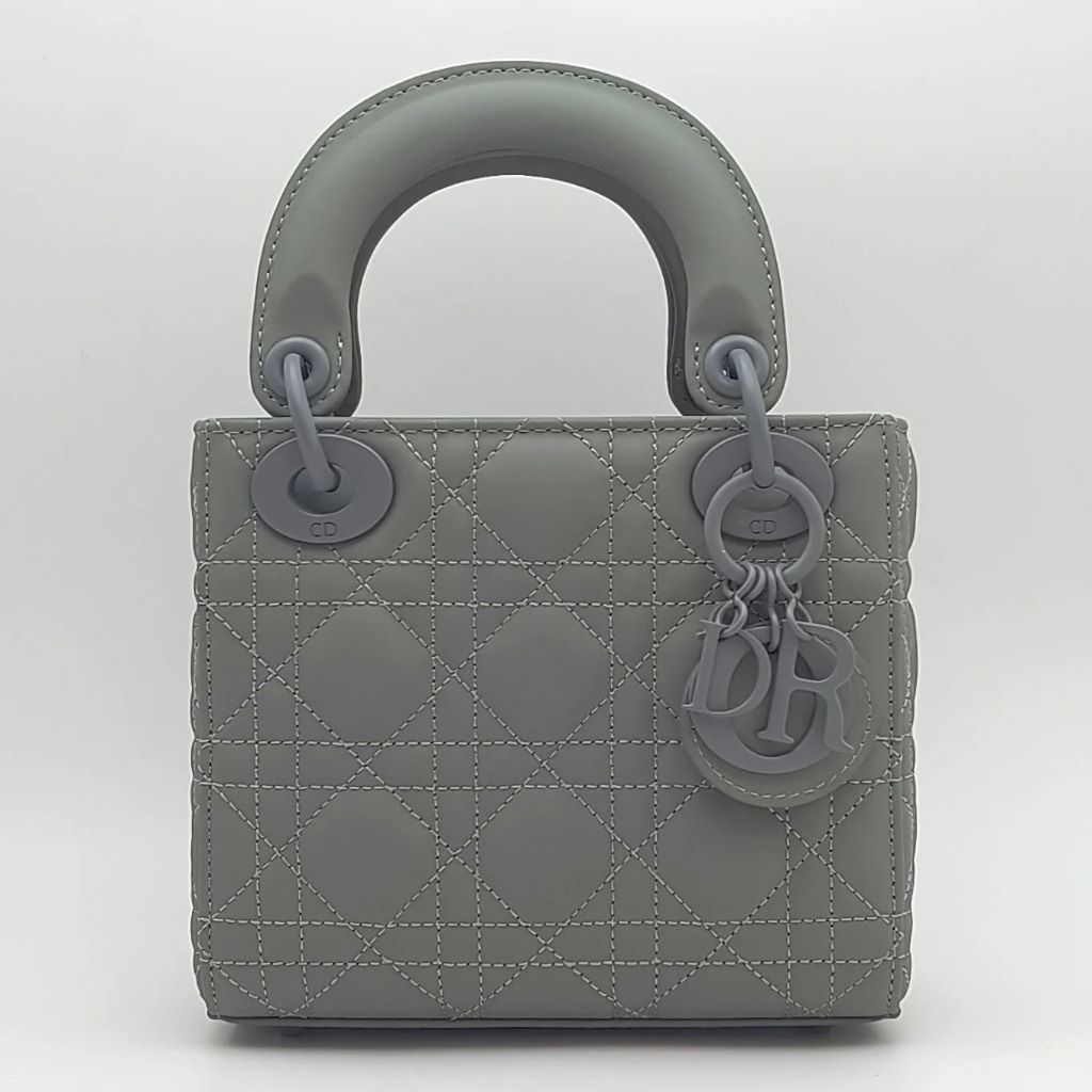 Dior Mini Lady Dior Bag Ultra Matte Grey (Category: Luxury Bags & Wallets) located in Cebu City. Submitted by affordabagss (Listing ID 1465483363, Image 1). Description: Dior Mini Lady Dior bag in grey-green Ultra Matte Cannage calfskin. Features tonal D.I.O.R. charms, structured top handles and a removable chain strap. Finished with the signature Cannage stitching and can be carried by hand or worn crossbody. Length: 17 cm Height: 15 cm Depth: 7