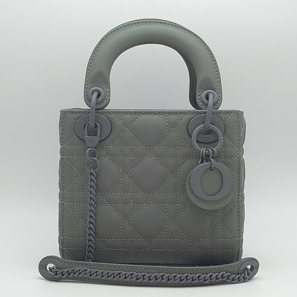 Dior Mini Lady Dior Bag Ultra Matte Grey (Category: Luxury Bags & Wallets) located in Cebu City. Submitted by affordabagss (Listing ID 1465483363, Image 2). Description: Dior Mini Lady Dior bag in grey-green Ultra Matte Cannage calfskin. Features tonal D.I.O.R. charms, structured top handles and a removable chain strap. Finished with the signature Cannage stitching and can be carried by hand or worn crossbody. Length: 17 cm Height: 15 cm Depth: 7