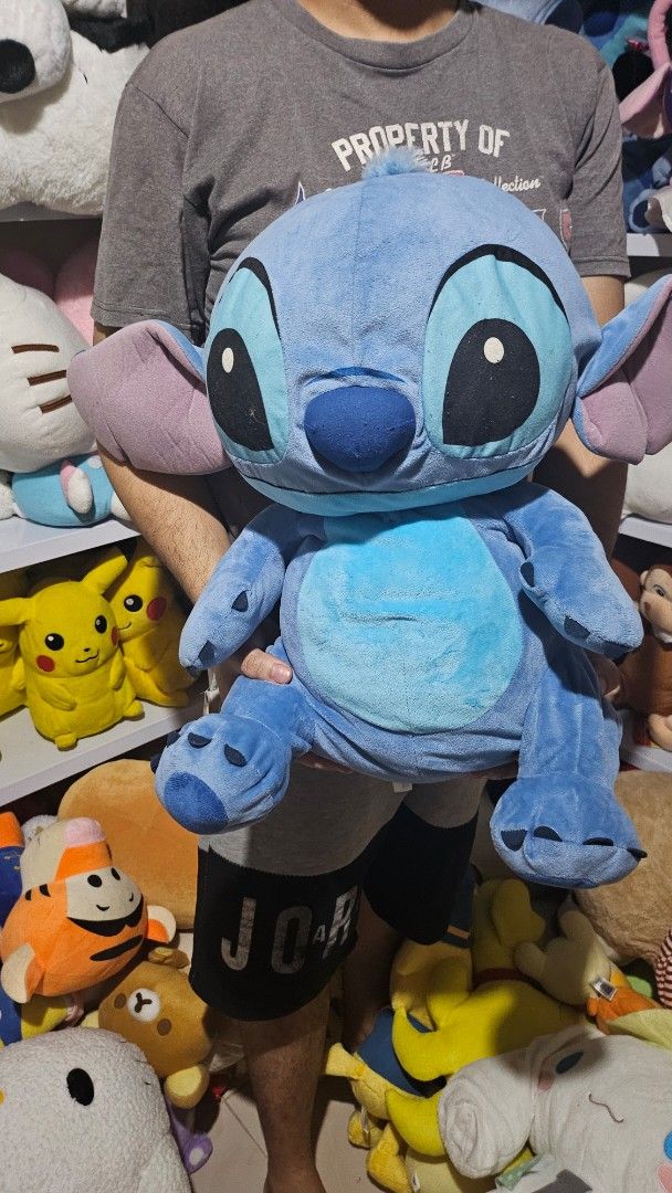 Disney Stitch Big Blue Plush Toy (Category: Plushies & Soft Toys) located in Manila. Submitted by maras_luxury18 (Listing ID 1465569440, Image 3). Description: - Large Disney Stitch plush toy - Super soft blue fur with floppy purple-lined ears - Detailed paws with claws and toe beans - Clean, well-cared-for condition - Great for hugging or as a gift for Disney fans.