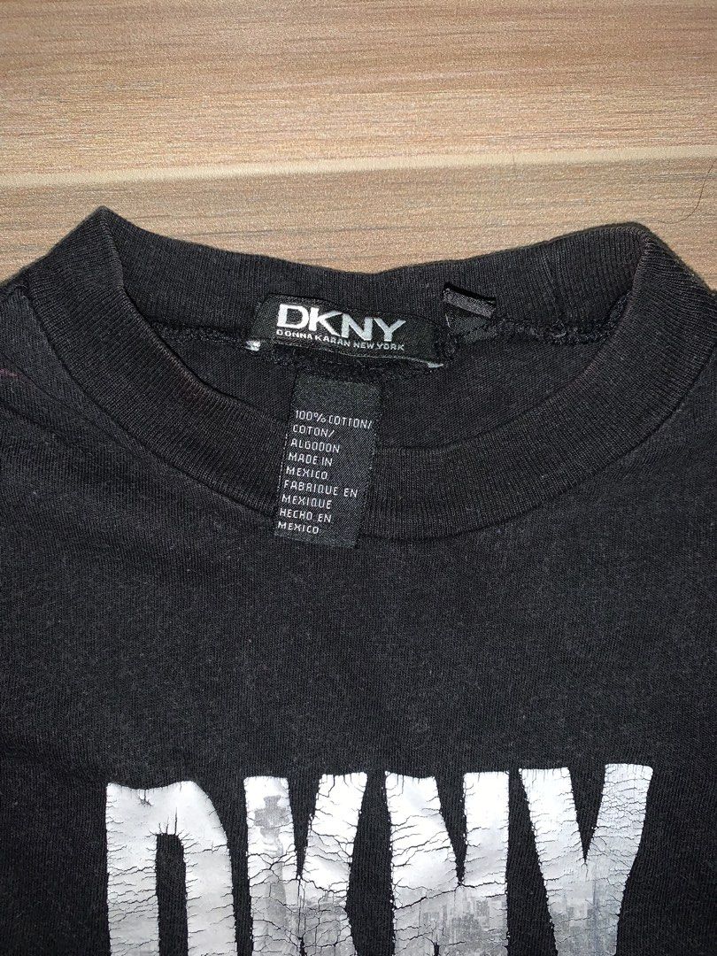 DKNY Black Logo T-Shirt (Category: Shirts) located in Antipolo. Submitted by _ni3lly (Listing ID 1465479950, Image 2). Description: - Brand: DKNY (Donna Karan New York) - Color: Classic Black - Size: Standard Fit (Tag intact) - Material: 100% Cotton, Made in Mexico.