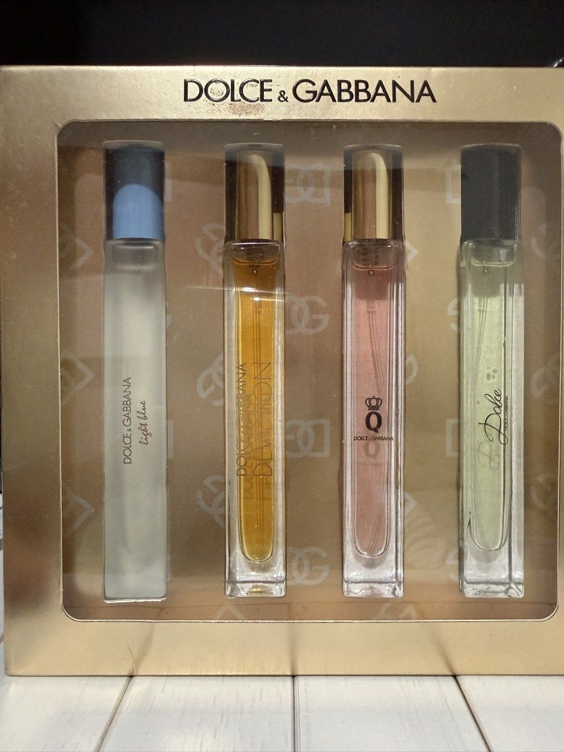 Dolce & Gabbana Mini Perfume Gift Set 4x10ml (Category: Fragrance & Deodorants) located in Talisay. Submitted by grazelle_1985 (Listing ID 1465508634, Image 1). Description: - Brand new and sealed D&G fragrance gift set - Made in Italy - Contains four 10ml travel-friendly spray bottles - Scents included: Light Blue EDT, Devotion EDP, Q EDP, and Dolce EDP - Back of the box includes complete ingredient lists and volume details - Perfect for gifts, 