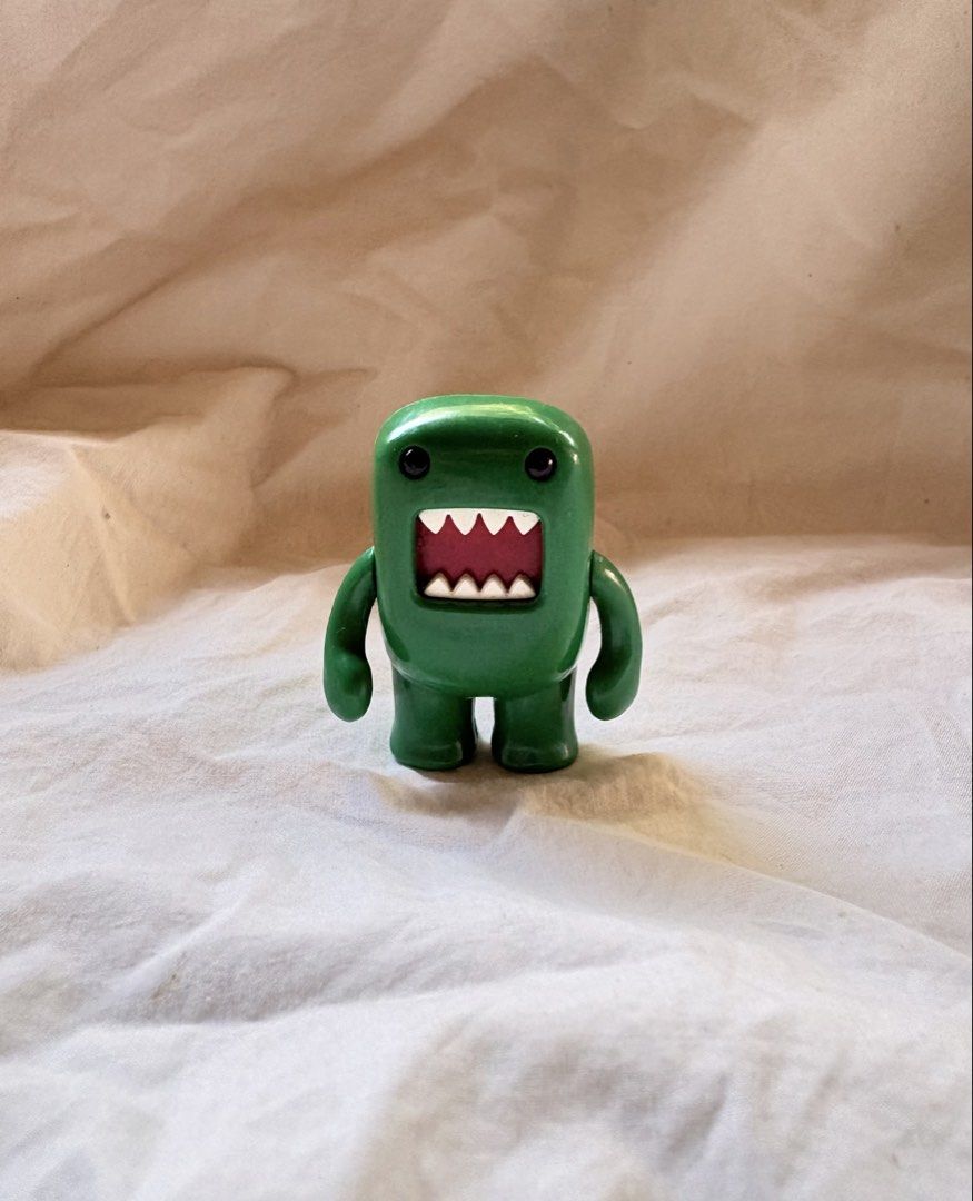 Domo Green Collectible Figure (Category: Designer & Blind Box Toys) located in Tuguegarao City. Submitted by jasminecoll (Listing ID 1465539074, Image 2). Description: - Authentic niko and... x Domo collaboration figure - Made of durable hard plastic in vibrant green - Stamps on bottom feet for authenticity - Stands firmly on its own with no issues - perfect for desk or shelf display.