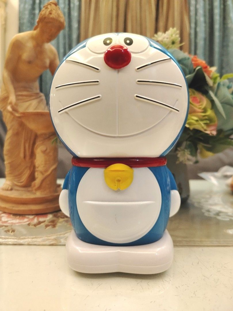 Doraemon Large Figure Coin Bank (Category: Character Goods) located in San Fernando. Submitted by jpmarketplace2023 (Listing ID 1465492798, Image 1). Description: 💚 All items are authentic from Japan. 💛 MOP: GCash (❌️ GCash Protect) 🩵 MOD: LBC only (❌️ S. Checkout, COD, COP) 💙 Meet-up: Vista Mall, San Fernando, Pampanga 💜 All items are on-hand. 🧡 First to pay gets the item first. ❤️ Breakable items are packed with care and caution. Seller w