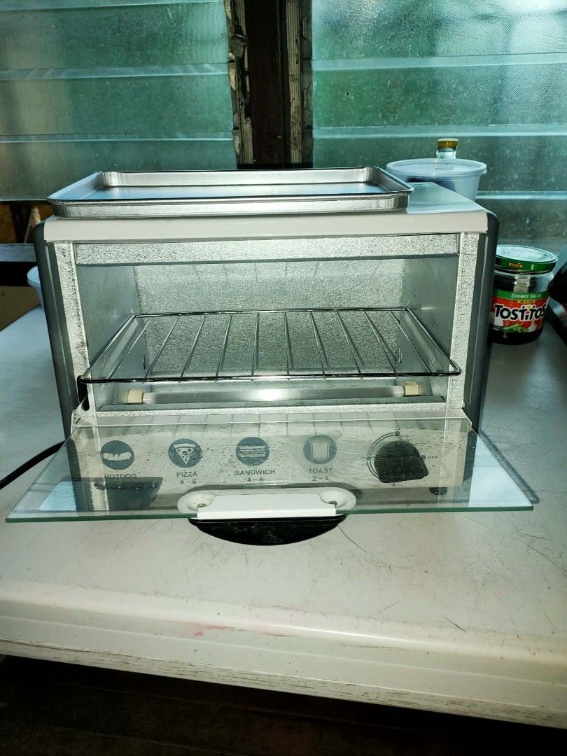Dowell 6L Oven Toaster (Model: DOT-615 (Category: Bakeware) located in Paranaque City. Submitted by yumme (Listing ID 1465467947, Image 3). Description: Dowell 6L Oven Toaster (Model: DOT-615 i only used it once like brand new .