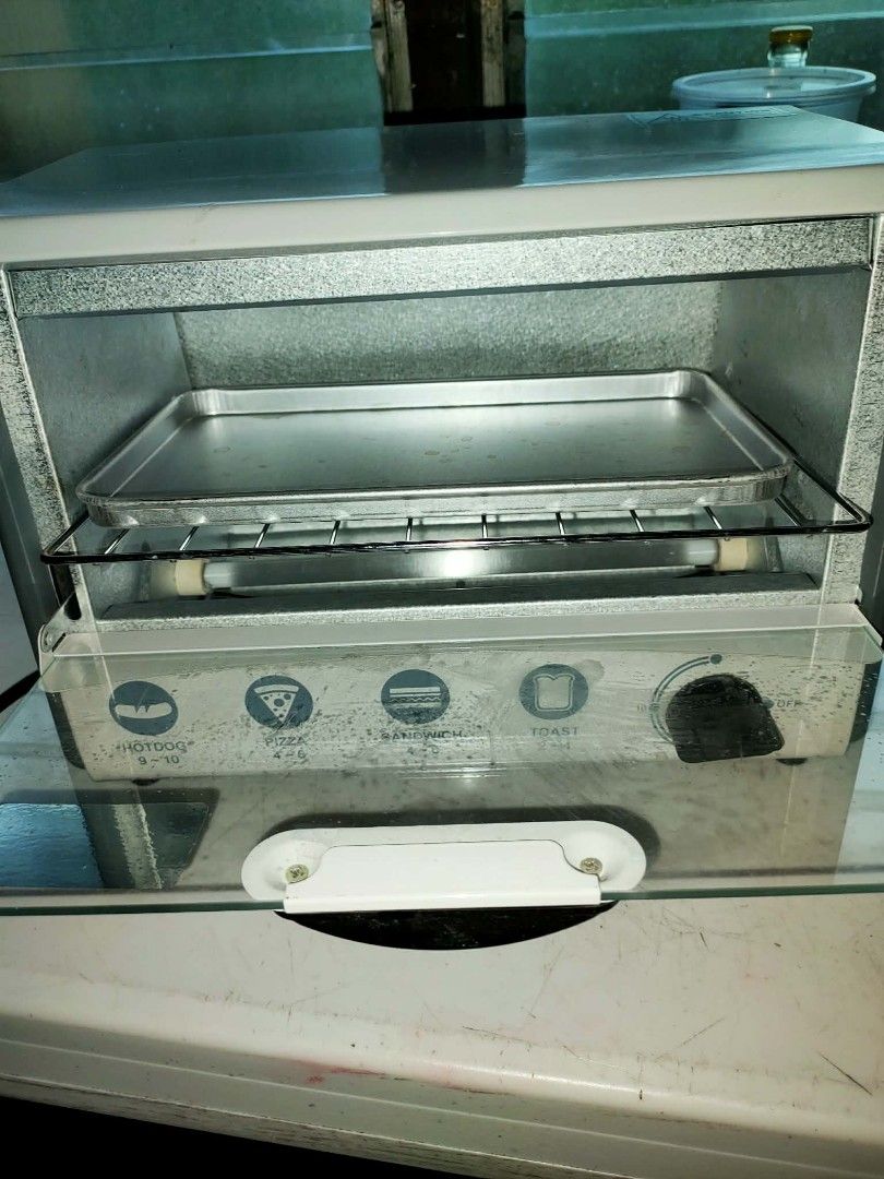 Dowell 6L Oven Toaster (Model: DOT-615 (Category: Bakeware) located in Paranaque City. Submitted by yumme (Listing ID 1465467947, Image 2). Description: Dowell 6L Oven Toaster (Model: DOT-615 i only used it once like brand new .