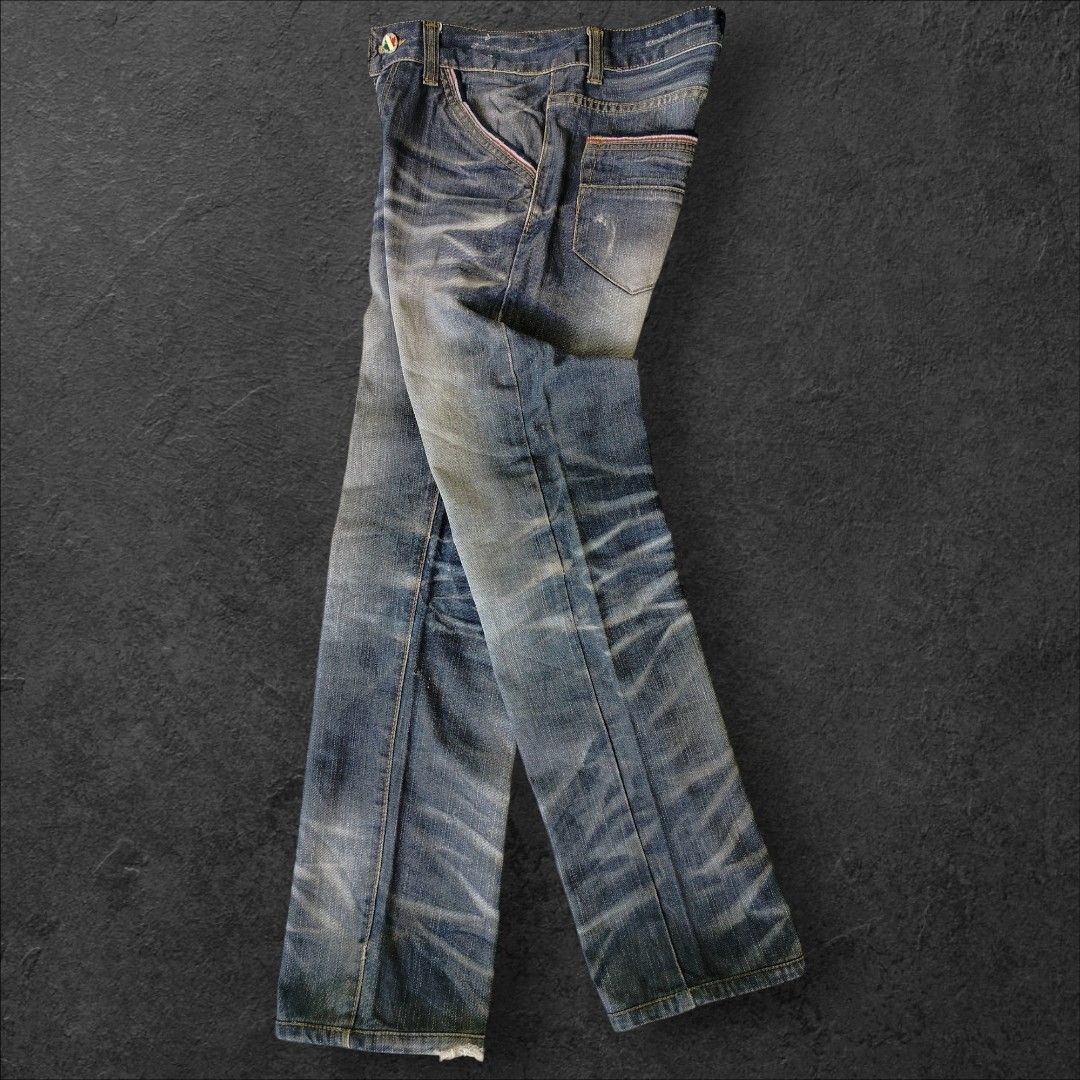 Dsquared2 Flavor Distressed Denim Jeans (Category: Jeans) located in Manila. Submitted by gerald_quinto (Listing ID 1465476701, Image 1). Description: - Brand: Dsquared2 -Size 28-29 -Length 39 -Hem 7 - Style: Vintage-wash straight leg jeans with heavy distressing and whiskering - Pockets: Classic 5-pocket styling with unique angled front pockets and contrast red and white stitching - Details: Branded leather back patch and large round embroidered