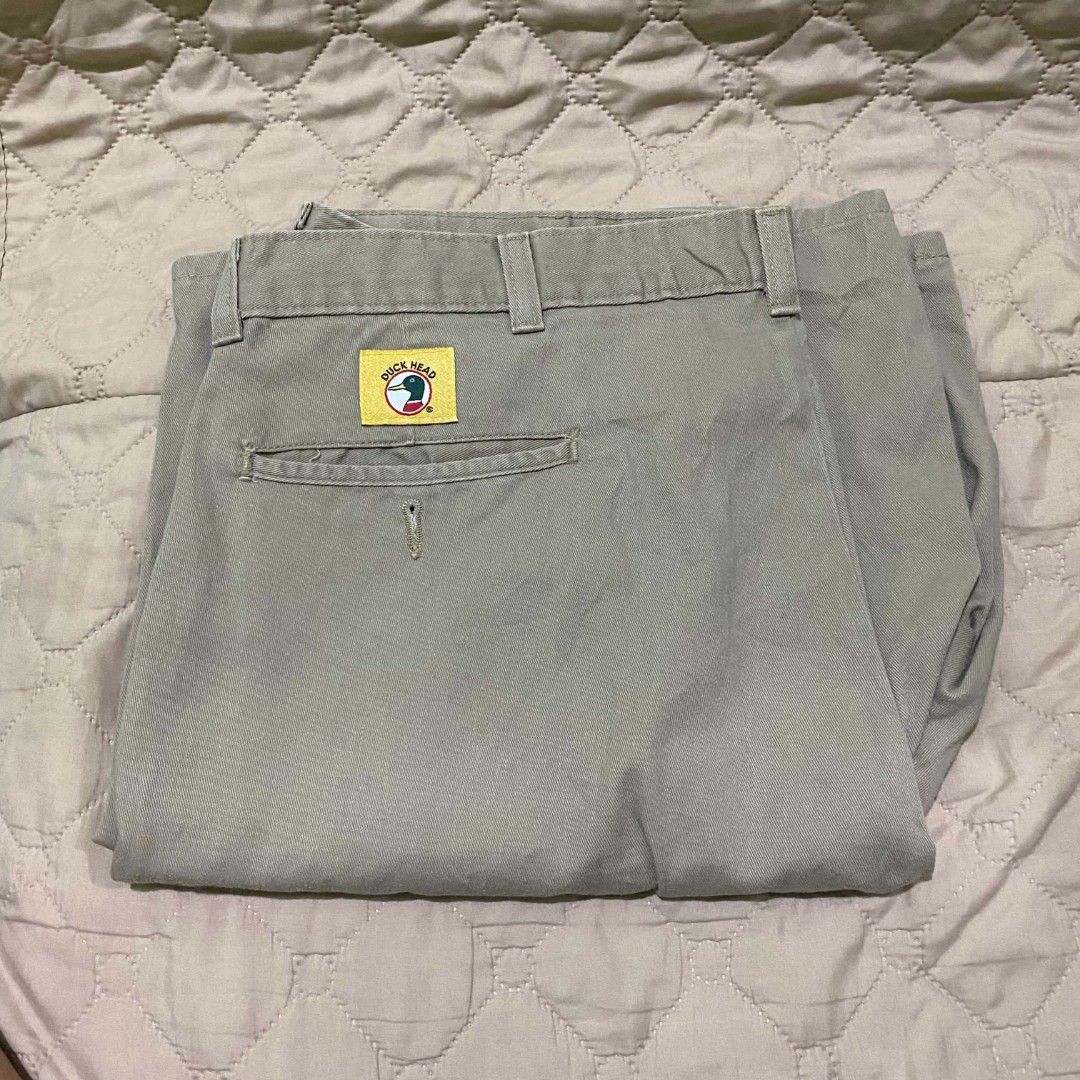 Duck Head khaki Short size 38 (Category: Trousers) located in Quezon City. Submitted by elihur.tuazon (Listing ID 1465481017, Image 1). Description: - Brand/Style: Vintage Duck Head khaki trousers - Size: 38 - Material: 100% cotton (Made in Costa Rica of US components) - Design: Pleated front, classic casual style - Features: Back pocket with button closure and signature Duck Head yellow patch - Care: Machine washable.