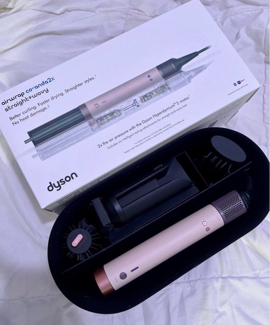 Dyson Airwrap Coanda2x (Ceramic pink) (Category: Hair) located in Manila. Submitted by gentletree_87852b (Listing ID 1465509261, Image 1). Description: Still negotiable Bought last September 2026 With receipt RFS: impulsive buying, used only twice - Inclusions: Presentation case, 6 intelligent styling attachments - Condition: Brand new / complete set.