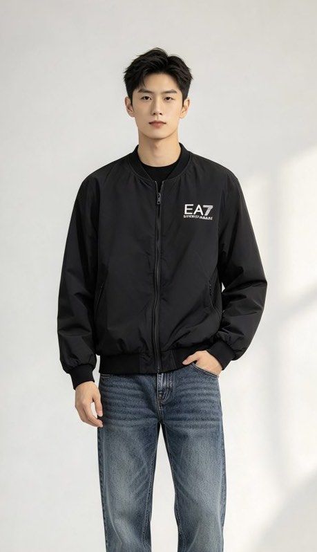 EA7 Emporio Armani Black Bomber Jacket (Category: Coats, Jackets and Outerwear) located in Paranaque City. Submitted by preluxeshop_ph (Listing ID 1465549463, Image 1). Description: EA7 Emporio Armani Black Bomber Jacket - Color: Black with white branding - Style: Bomber jacket with full zip front - Details: White EA7 logo on chest, large embroidered MILANO text on back shoulders - Interior: Quilted inner lining with branded neck tag - Fit/Feel: 