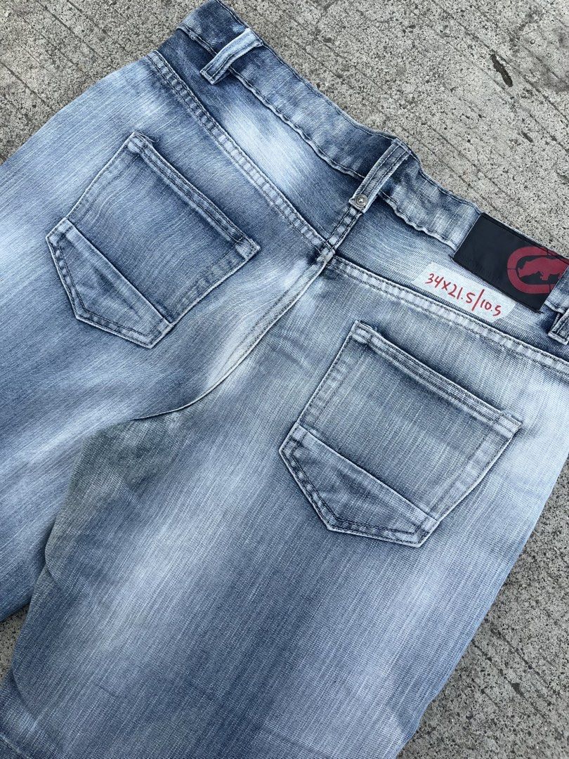 Ecko Untd. Denim Blue Jeans Size 34x22.5 (Category: Jeans) located in Cebu City. Submitted by guttathreads (Listing ID 1465455340, Image 3). Description: - Brand: Ecko Untd. - Style: Regular fit denim jeans with classic 5-pocket styling - Color/Wash: Light blue acid wash - Size: 32x22.5 -Leg open: 10.5 - Material: Comfortable cotton and polyester blend, machine washable - Details: Branded metal buttons and small logo tab on coin pocket - Origin: 