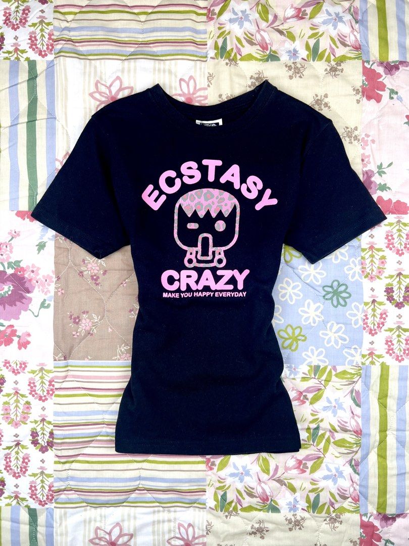 Ecstasy Crazy Character Baby Tee (Category: Shirts) located in Angeles City. Submitted by fruits.ph (Listing ID 1465423050, Image 1). Description: Measurements B:14” W:11.5” L:21” Size on Tag: ❌ Best Fit: S-M *Flat lay measurements* Mannequin Size: M (34”; 25”) Color Rate: 10/10 Flaws: None Fabric Type: Cotton/ Stretchable Fabric ***Color may vary due to lighting. This item is properly washed and disinfected.*** .
