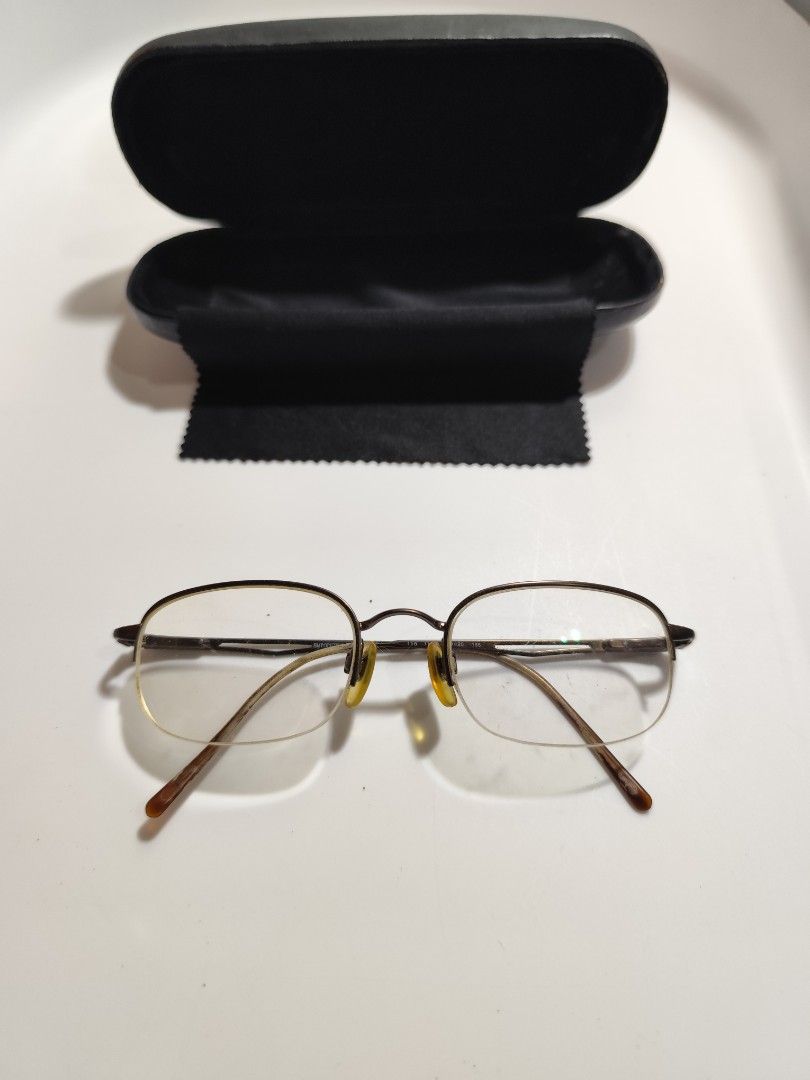 Emporio Armani Frames Semi-Rimless (Category: Sunglasses & Eyewear) located in Cebu City. Submitted by icoolectnsellect (Listing ID 1465517632, Image 1). Description: Issue: Scratch sa Temple. Dirt and RX lens. Bought at Garage Sale. Authenticity not Guaranteed, di ko alam if legit or Fake. Buy @ your own Risk. All EyeGlasses or Sun Glasses ay may Grado or Prescription Glasses. Please be careful para di masira mata nyo, you can change the lens an