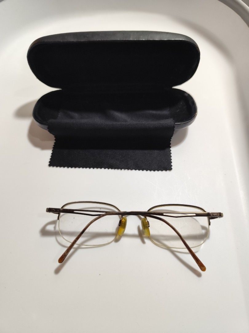 Emporio Armani Frames Semi-Rimless (Category: Sunglasses & Eyewear) located in Cebu City. Submitted by icoolectnsellect (Listing ID 1465517632, Image 2). Description: Issue: Scratch sa Temple. Dirt and RX lens. Bought at Garage Sale. Authenticity not Guaranteed, di ko alam if legit or Fake. Buy @ your own Risk. All EyeGlasses or Sun Glasses ay may Grado or Prescription Glasses. Please be careful para di masira mata nyo, you can change the lens an