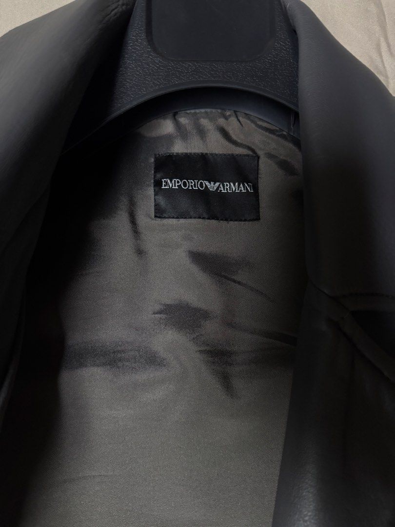 Emporio Armani Grey Leather Biker Jacket (Category: Coats, Jackets and Outerwear) located in Manila. Submitted by seangoart (Listing ID 1465502392, Image 2). Description: - Authentic Emporio Armani leather biker jacket in a versatile grey shade - Edgy asymmetrical front zip closure - Stylish quilted ribbed detailing on sleeves and shoulders - Two lower front zipped welt pockets for daily essentials - Fully lined interior with original brand label