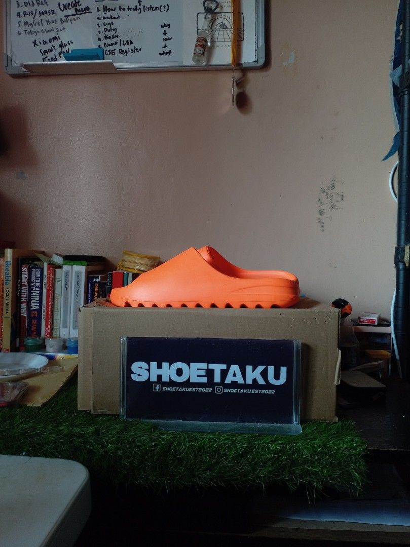 Enflame Orange Yeezy Slides (LW) (Category: Slippers & Slides) located in Naga. Submitted by shoetaku (Listing ID 1465573742, Image 1). Description: Negotiable pa poo since pinapaubos na! Size 9 and 10 US po ng Yeezy with included box. RFS: need funds for education.