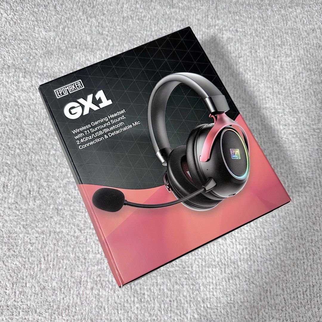 Epomaker GX1 Wireless Gaming Headset Pink (Category: Headphones & Headsets) located in Paranaque City. Submitted by hershey_august (Listing ID 1465400384, Image 2). Description: Epomaker GX1 wireless gaming headset in pink and grey colorway. Offers 7.1 surround sound, 2.4GHz, USB, and Bluetooth connectivity options. Includes detachable microphone, USB dongle, charging cable, user manual, and original box. Works across PC, consoles, and mobile dev