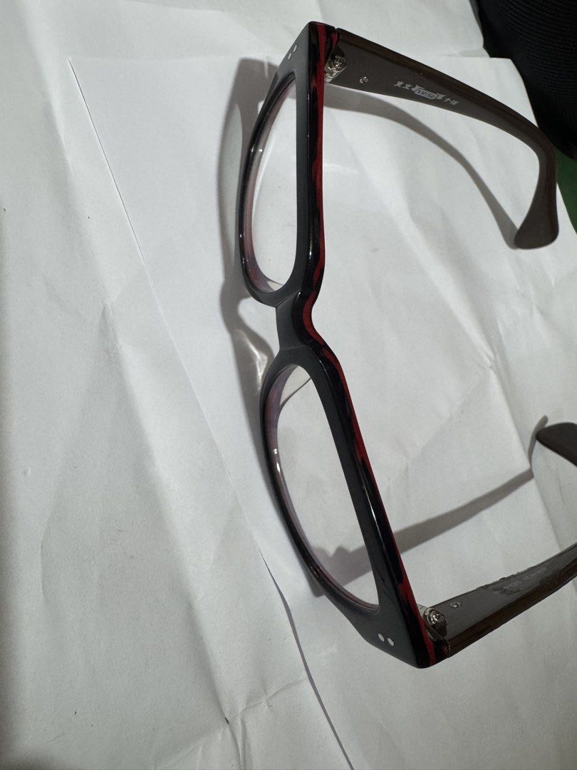 Evisu EVH-8129 Eyeglasse 100% Genuine (Category: Sunglasses & Eyewear) located in Manila. Submitted by wildbear.e10374 (Listing ID 1465422352, Image 3). Description: - Brand: Evisu - Model: EVH-8129 - Colorway: Dark brown and red tortoise shell pattern with signature white seagull logos - Details: Tokyo Osaka branding printed inside the temple arm - Size: 53-16-145 - Hardware: Sturdy metal hinges - Condition: Well-maintained, frame only (ready fo