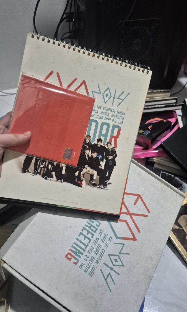 EXO GREETINGS 2014 (Category: CDs & DVDs) located in Manila. Submitted by shadeysales (Listing ID 1465448764, Image 3). Description: Na luma na po sa storage; with box, calendar and CD. Takeall: 'Wag na po tumawad sobrang mura na po 😊 Rfs: need money Lalamove/LBC: Shouldered by the buyer Meetup: Megamall, Shangri-la Mall, Guadalupe, Makati City Hall.