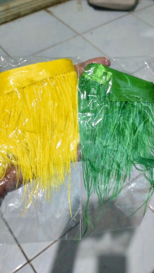 Feathers set for DIY costume take all (Category: Craft Supplies & Tools) located in Valenzuela. Submitted by diane.35 (Listing ID 1465481967, Image 1). Description: - Assorted colorful feather trims: bright green, yellow, vibrant red, black & white polka dots, and natural brown iridescent shades - Pre-sewn onto fabric header tapes for quick and easy application - Ideal for costume making, clothing design, millinery, and craft projects - Packaged 