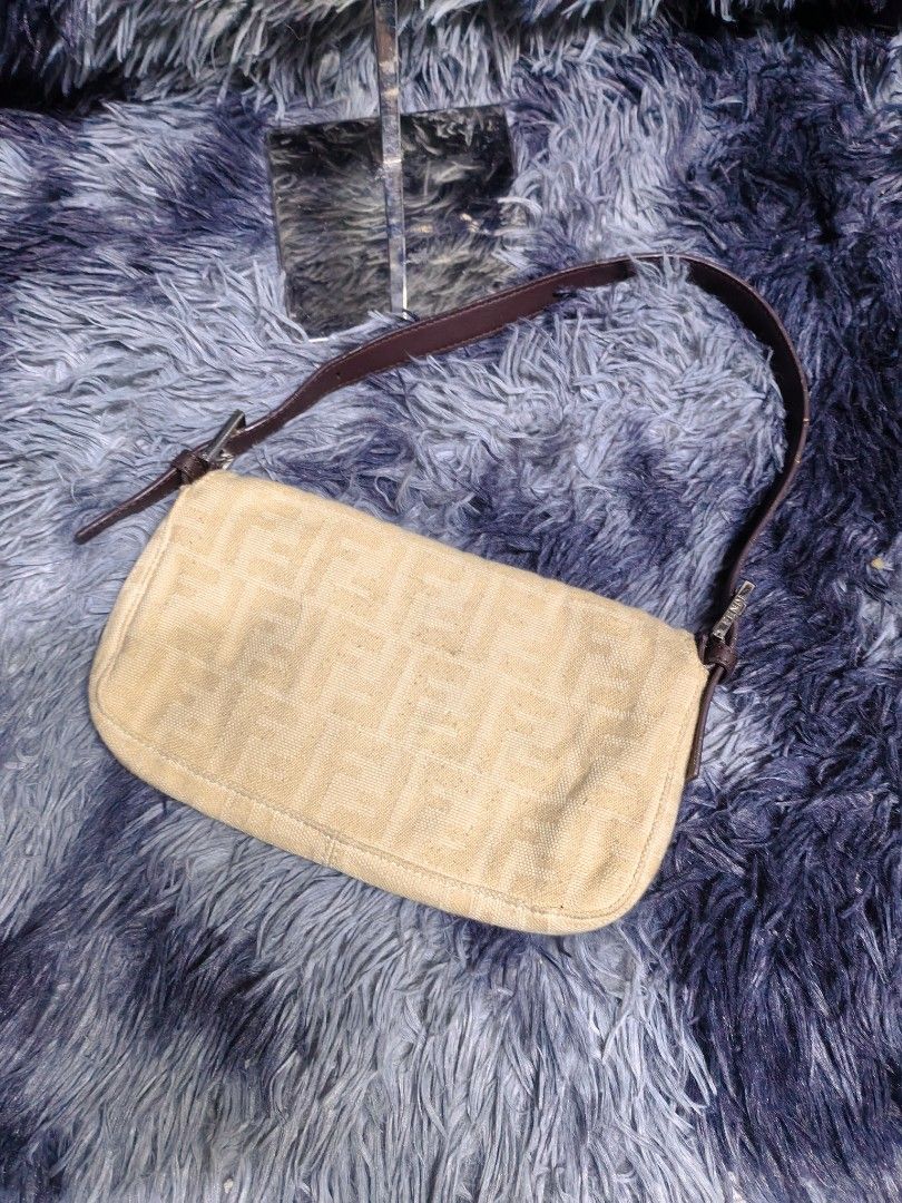 Fendi baguettes (Category: Luxury Bags & Wallets) located in Iloilo. Submitted by luxury.ilo1984 (Listing ID 1465473778, Image 2). Description: Thrifted Ukay Source Very Good to Excellent Condition Rank AB... FF under zep Issue normal sign of use Lang po check last 2 pics Dimes Lenght 6inch by 10inch witdh Super Ganda nito sa personal kili bag.