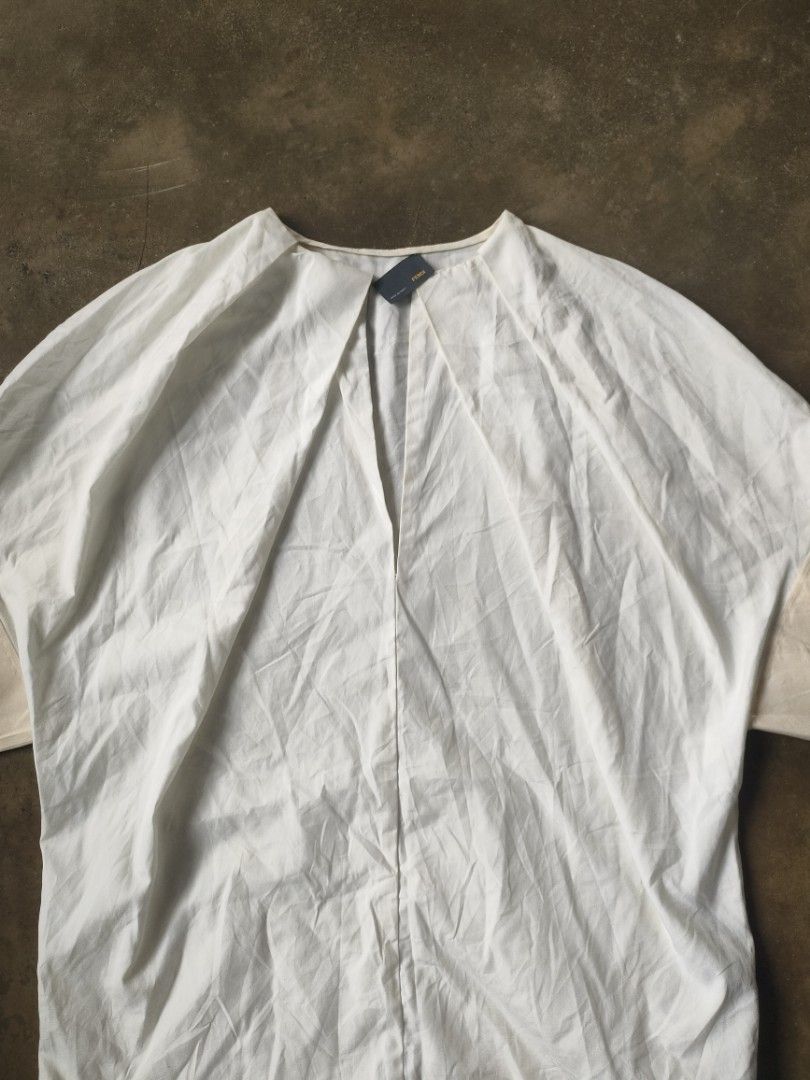 FENDI White Cotton Shirt (Category: Shirts) located in Angeles City. Submitted by thestorageroom (Listing ID 1465459675, Image 2). Description: not totally well used as is where is from japan boxes only needs wash has yellow stains maganda po to pag nalabhan no holes and scratches yung neck tag isa lang talaga nakatahi size 40 on tag offer me for info and dimension negotiable +sf.