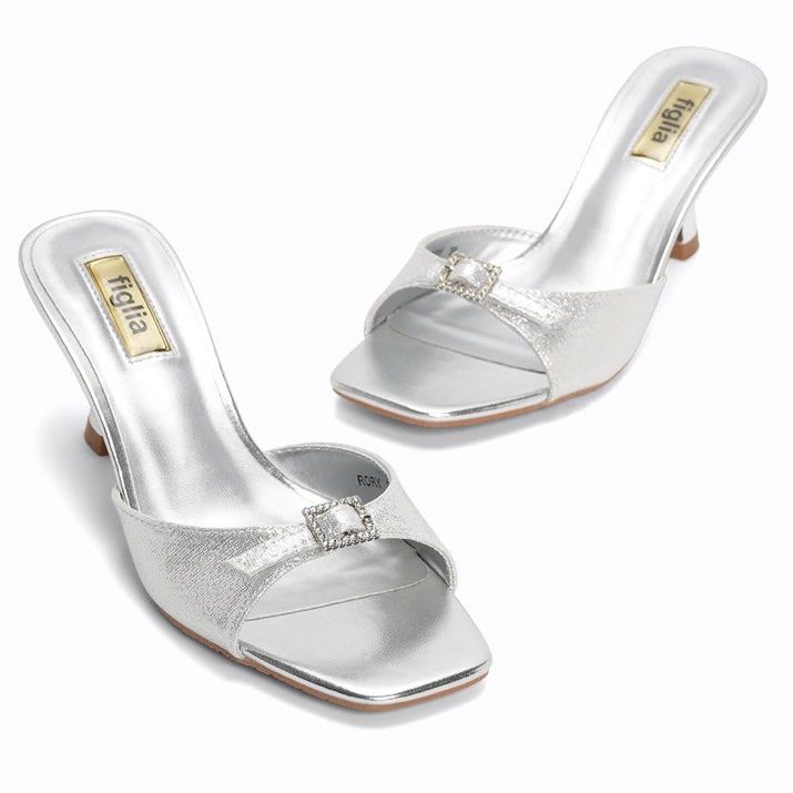 Figlia Rory Silver Heel Slides Sandals (Category: Heels) located in Cebu City. Submitted by submariene (Listing ID 1465442443, Image 1). Description: Figlia Rory Size 35 Heel Slides - used twice for events only - no visible flaws (like new) - 2.5 inch heel - perfect for elegant night outs - with box - originally bought for ₱1799 in SM Store last September .