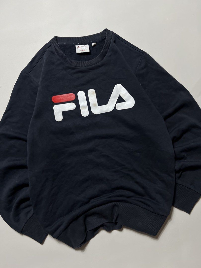 Fila big logo script sweatshirt (Category: Hoodies) located in Manila. Submitted by tripnimichael (Listing ID 1465463379, Image 2). Description: Size-Large Width-21 Length-26 Issue-None .