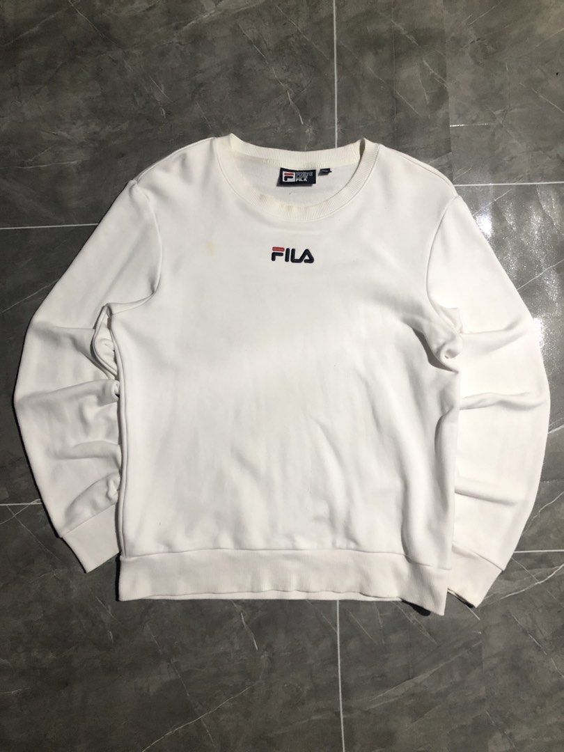 FILA white mid script embroided longsleeve (Category: Coats, Jackets and Outerwear) located in Manila. Submitted by buksthrifthing (Listing ID 1465436550, Image 1). Description: 21 by 26 Small to Medium No issue 9.5/10 color rate Good condition.
