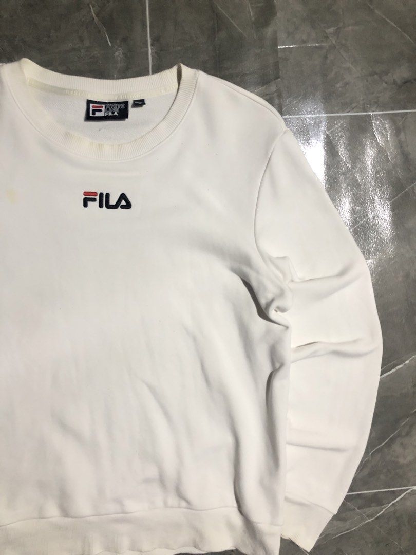 FILA white mid script embroided longsleeve (Category: Coats, Jackets and Outerwear) located in Manila. Submitted by buksthrifthing (Listing ID 1465436550, Image 3). Description: 21 by 26 Small to Medium No issue 9.5/10 color rate Good condition.