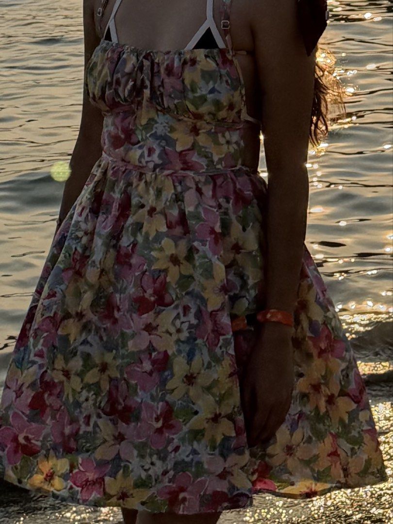 Floral Summer Halter Dress Open Back (Category: Dresses) located in Valenzuela. Submitted by declutter4hgs (Listing ID 1465535771, Image 2). Description: - Style: Floral halter neck dress with flare skirt - Colors: Pink, yellow, and blue floral pattern - Details: Tie-back open back design with gathered bust - Condition: Worn once for beach photos, excellent shape - Size: Fits xs-s frame can send more pics thru dm :)).