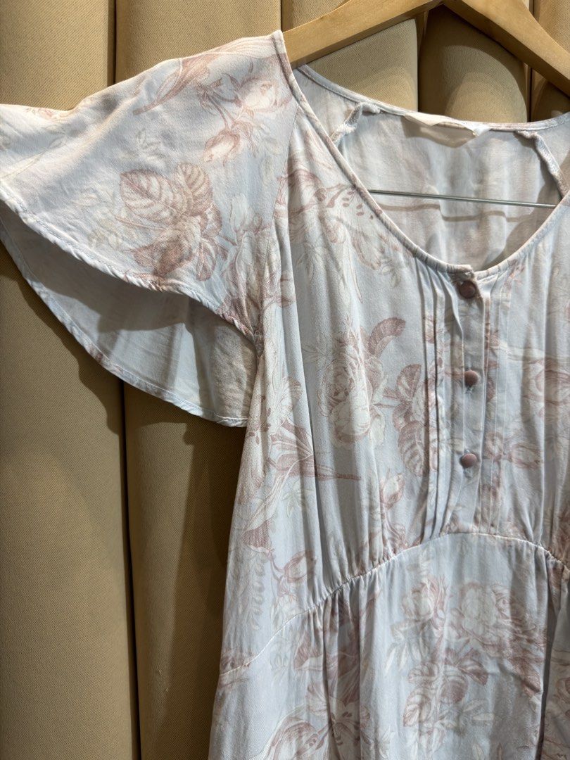 Flutter Sleeve Top (Category: Blouses) located in Manila. Submitted by glamstylemnl (Listing ID 1465498438, Image 2). Description: ♡ SIZE: S-M ♡ BUST: 35 ♡ Swipe left to see the actual color & details ♡ short ruffled sleeves / gathered front button placket ♡ HQ • 10/10 ♡ Ready to wear 👚.
