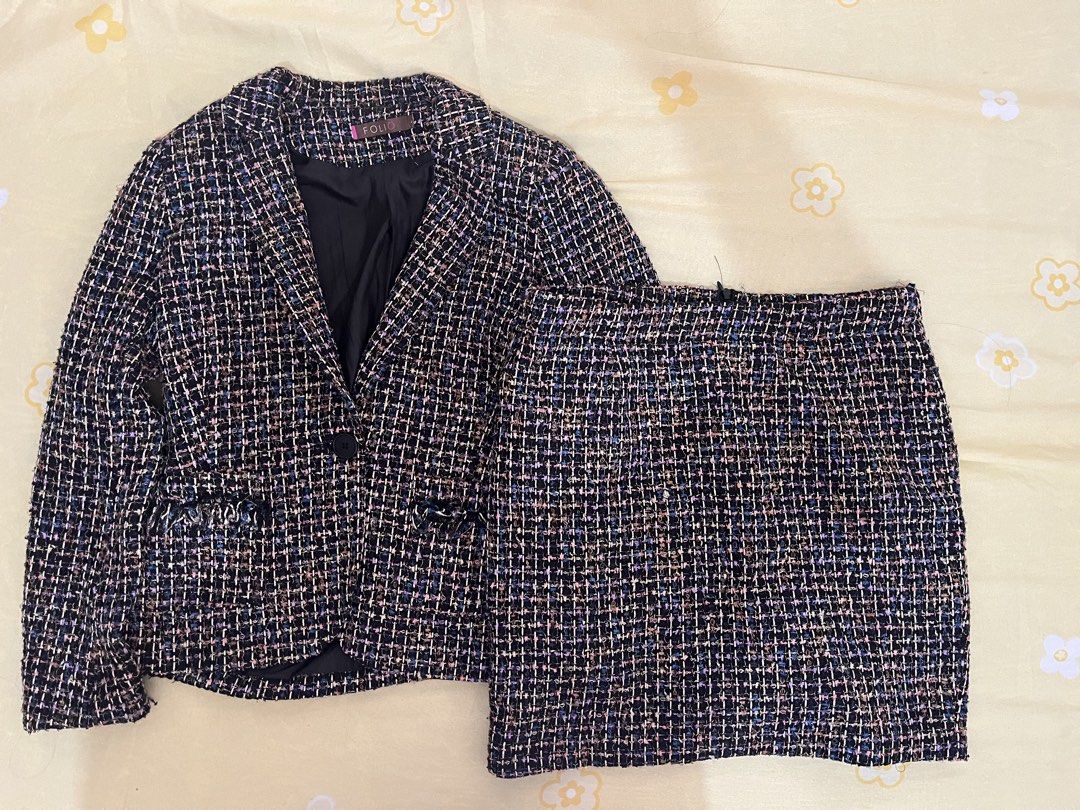 Folio Tweed Blazer and Skirt Set (Category: Sets or Coordinates) located in General Mariano Alvarez. Submitted by mysticalcloud (Listing ID 1465579101, Image 1). Description: Matching tweed set from Folio. Includes a single-button blazer with fringe pockets and a high-waist mini skirt. Black fabric woven with colorful threads in pink, blue, and white. Fully lined blazer interior. Wear together as a coordinated outfit or separately. Also available