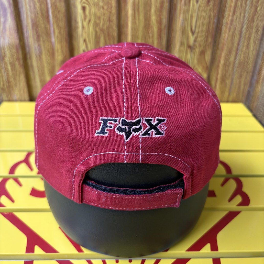 Fox Racing Red Hat Cap (Category: Caps & Hats) located in Dapitan. Submitted by payt3es_thrift. (Listing ID 1465392640, Image 3). Description: - Red Fox Racing cap - Classic black color with stylish white contrast stitching - Embroidered Fox logo on front and "FOX" text on the back - Adjustable velcro closure for a custom fit - 100% premium cotton, made in Korea - One size fits all.
