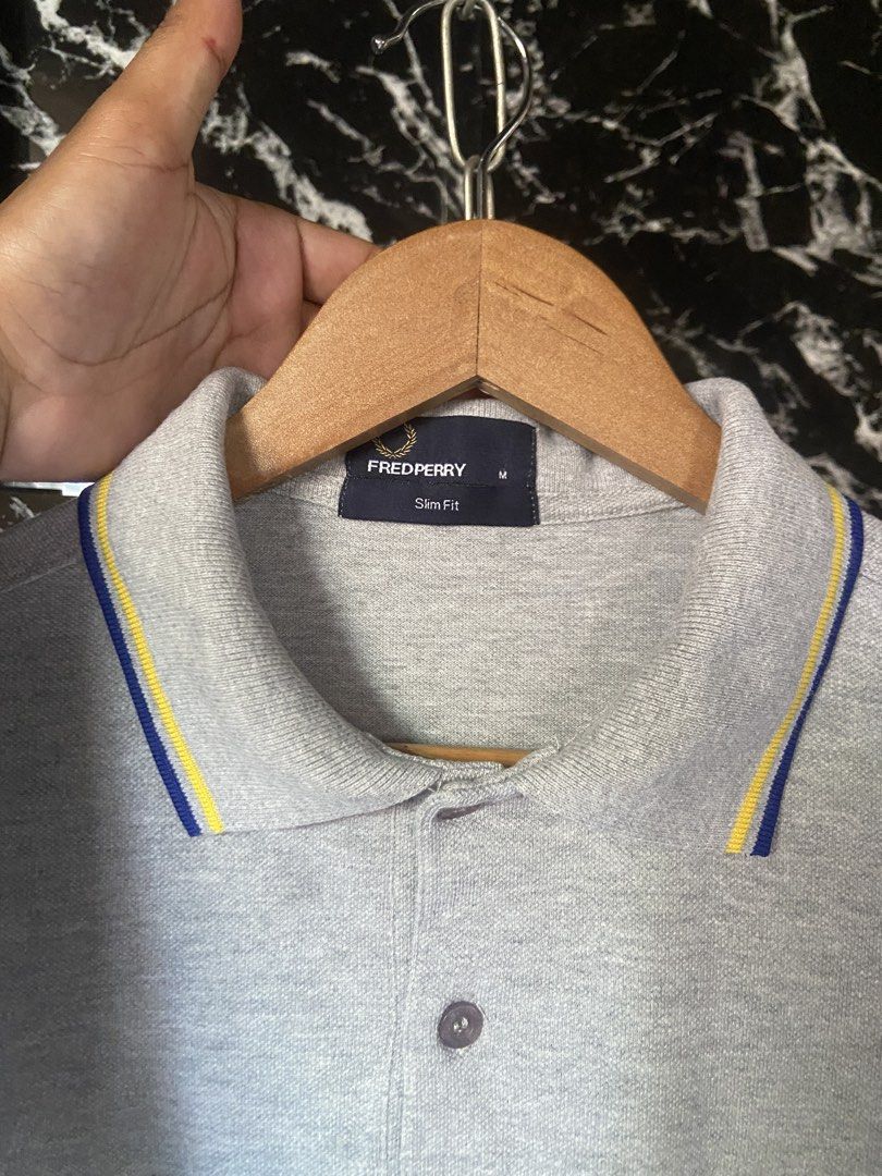 FRED PERRY POLO SHIRT (Category: Tshirts & Polo Shirts ) located in Hinigaran. Submitted by formalwear.ph (Listing ID 1465429552, Image 3). Description: •(FRED PERRY POLO SHIRT)• •Like New Condition •Size- Medium •Dimes- 19 by 26 •Cr - 9.8/10 •Flaws- NONE •Color may vary due to lightings •Washed and ready to wear✅ •Very Presentable to weaR PHP 📥+ sf Affordable ✅ NOTE : If interested kindly message me directly bcause my account is underlimit for 