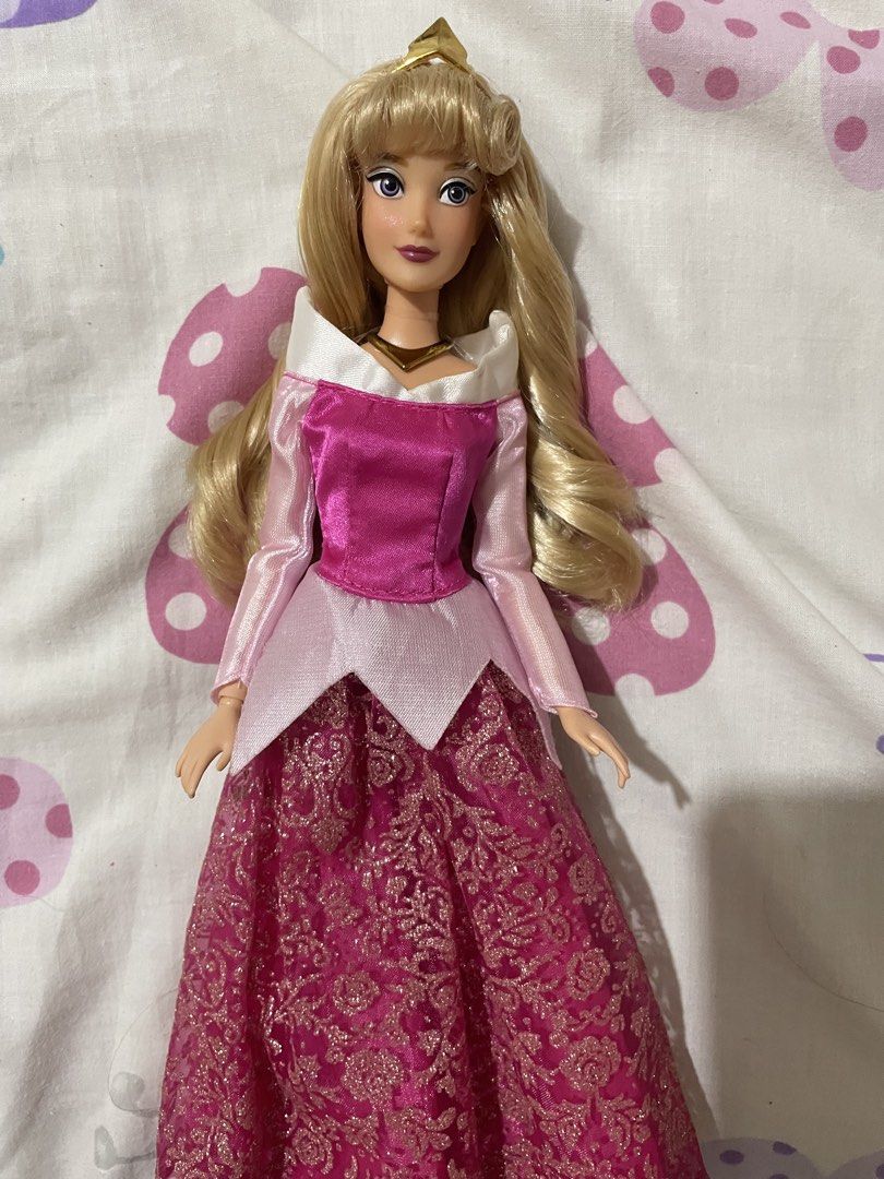 FS/FT: Disney Princess Aurora disney store (Category: Kids Toys) located in Angeles City. Submitted by livingdollaccesories (Listing ID 1465508049, Image 2). Description: like new disney store 2021 aurora doll for 750 complete necklace and crown with shoes, willing to trade for any of these auroras with this face mold.