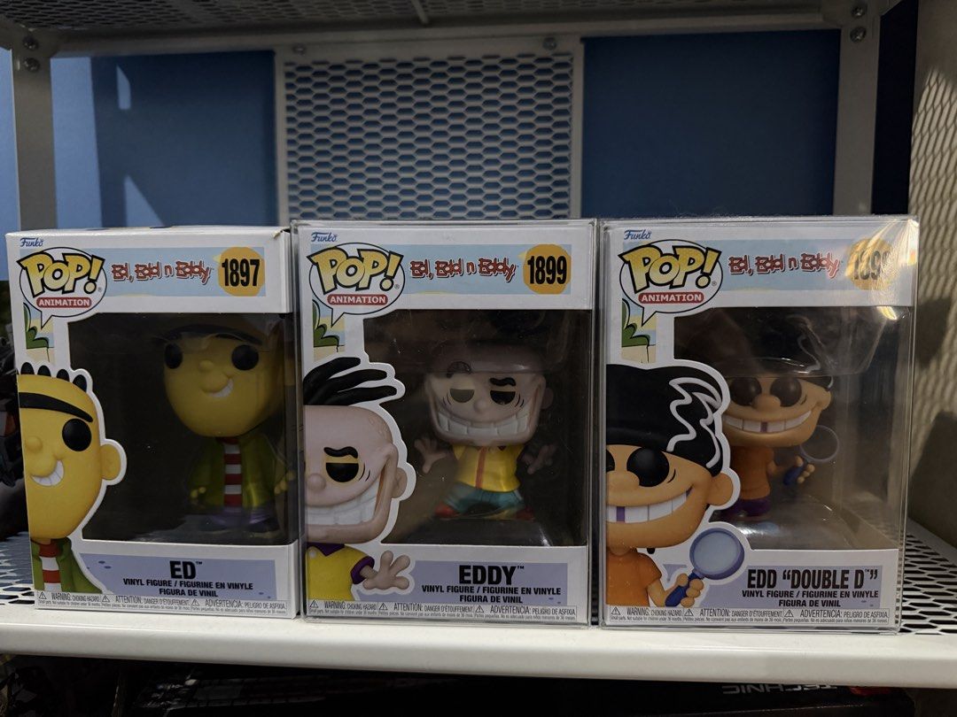 Funko Pop Ed Edd n Eddy Set (Category: Designer & Blind Box Toys) located in Taytay. Submitted by bonaventejill (Listing ID 1465542821, Image 1). Description: - Complete trio of Ed, Edd n Eddy Funko Pop vinyl figures - Includes numbers 1897 (Ed), 1898 (Edd Double D), and 1899 (Eddy) - All items come safely stored inside protective plastic cases except Ed - Clean boxes featuring clear, undamaged windows Take all for 3,000 Ed - 660 Edd - 1700 Eddy 