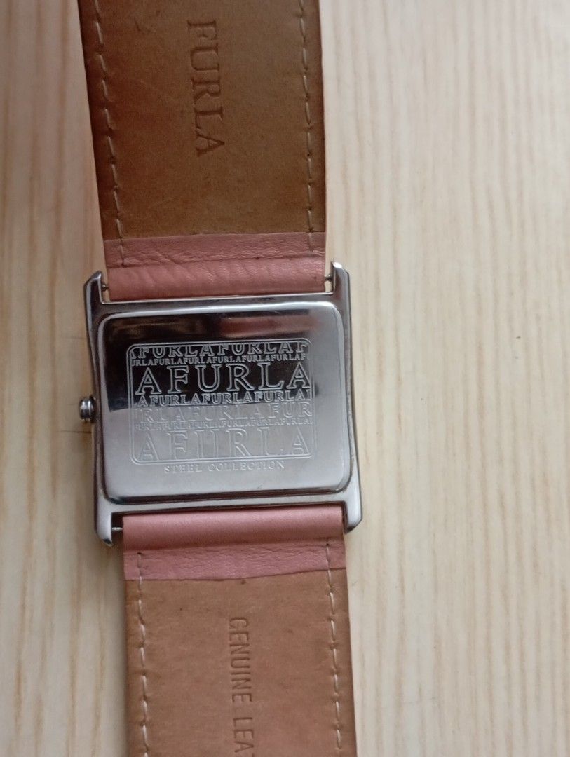 Furla (Category: Women's Watches) located in Las Pinas. Submitted by quick_deals_great_finds2 (Listing ID 1465413730, Image 3). Description: Original good working condition Quartz with battery Big size 45mm fits womens.