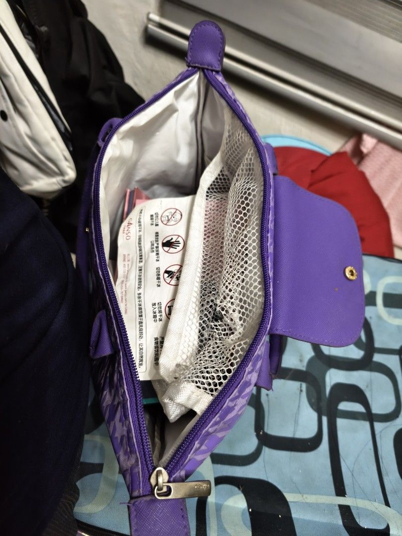 GANSO Purple Houndstooth Tote Bag Handbag (Category: Tote Bags) located in Cebu City. Submitted by raztadz (Listing ID 1465484271, Image 3). Description: - Brand: GANSO - Design: Eye-catching purple houndstooth pattern with solid purple leather-like handles - Closure: Front snap flap and secure top zipper with branded pull - Interior: Roomy and spacious for all your daily essentials - Condition: Excellent for everyday wear and standing out in sty