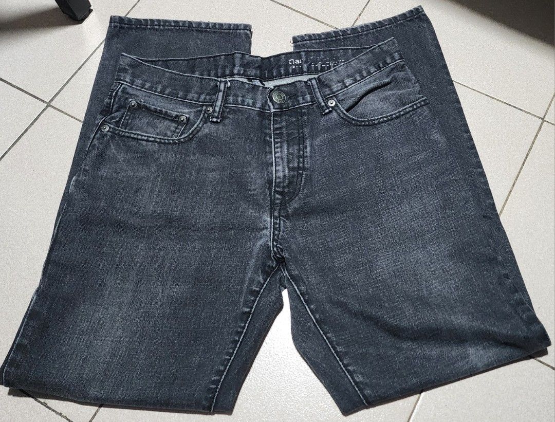 Gap Dark Wash Jeans Size 31/30 (Category: Jeans) located in Manila. Submitted by chichayako (Listing ID 1465452157, Image 1). Description: - Brand: Gap - Style: Straight leg, classic five-pocket design - Color/Wash: Dark charcoal with subtle fading - Size: 31" Waist, 30" Inseam - Material: Premium cotton denim - Details: Button fly and branded metal hardware.