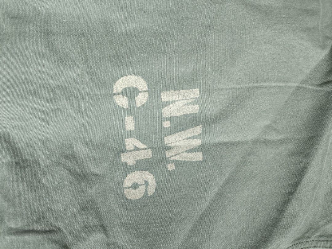 Gap Green Hooded Anorak Jacket Size L (Category: Coats, Jackets and Outerwear) located in Manila. Submitted by phillip.morris (Listing ID 1465396608, Image 2). Description: - Brand: Gap - Item: Green Cotton Anorak Jacket - Size: Large (25" x 27") - Closure: Half-zip front - Details: Drawstring hood and hem with white drawstrings intact, button cuffs, contrast yellow inner hood lining - Graphic: Stenciled N.W. C-46 text graphic near the front pock