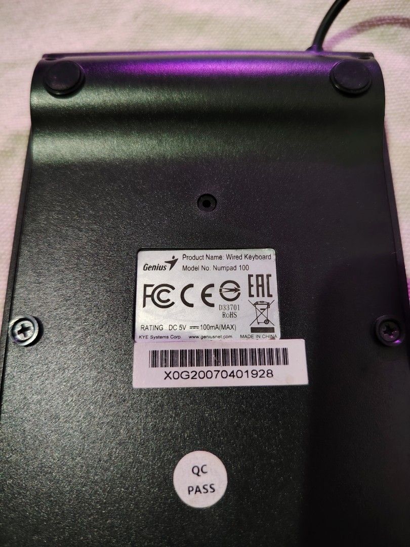 Genius Numpad (Category: Computer Keyboard) located in Mandaluyong City. Submitted by declutter_kween (Listing ID 1465525777, Image 2). Description: - Brand/Model: Genius Numpad 100 wired numeric keypad - Color: Sleek black - Connectivity: Plug-and-play USB cable attached - Layout: Standard layout including Num Lock, Delete, and triple zero (000) keys - Compatibility: Ideal for laptops without a dedicated number pad - Condition: Clean and 100% fu